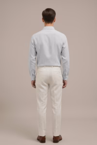 man-wearing-light-grey-linen-shirt-sitting-on-sofa